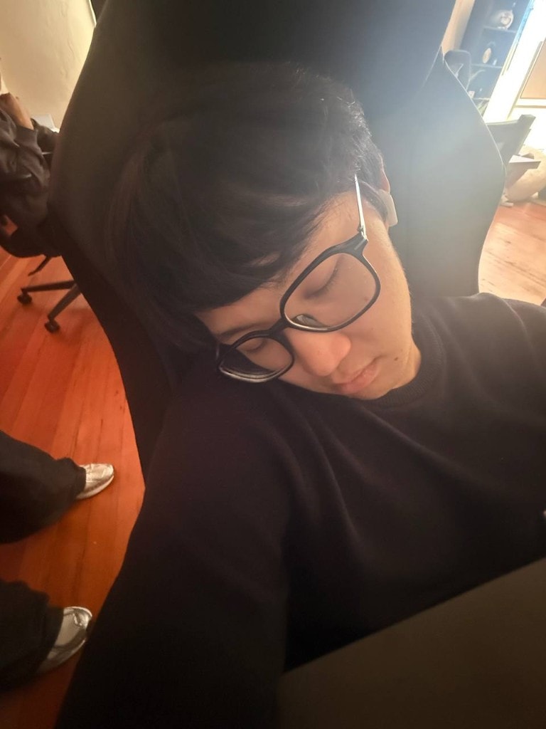 an engineer asleep at their desk